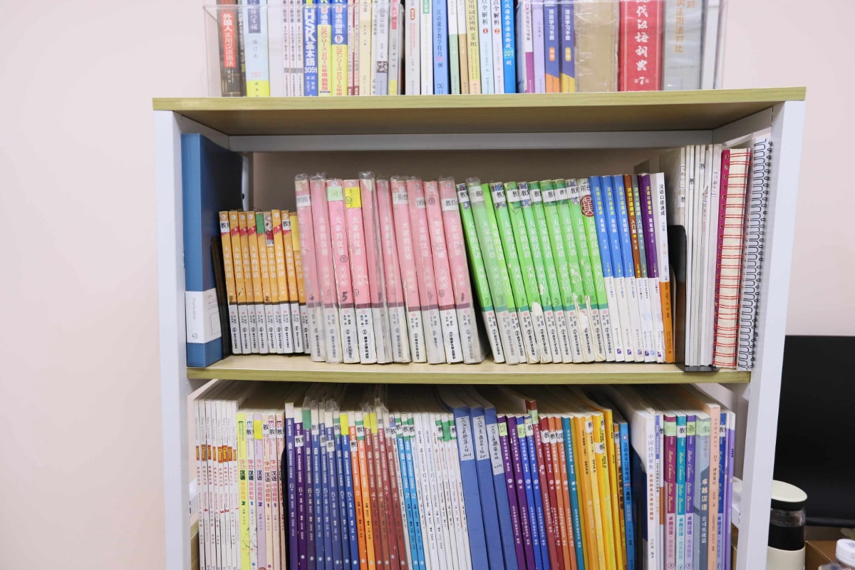 Student studying with textbook